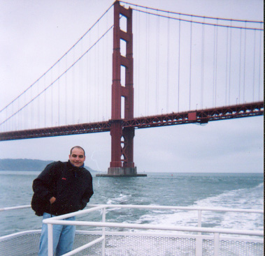 I am in front of Golden Gate Bridge on the Bay Cruise I took